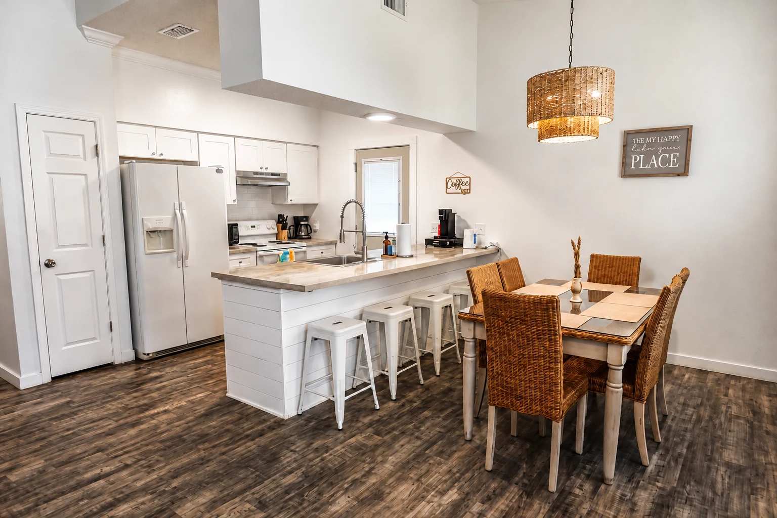 The bright kitchen and dining area at 6319 Poinciana Drive